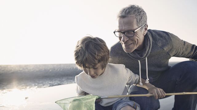 Nordea_xx_small-Grandfather and grandson at the ocean with starfish in fishing net.jpg